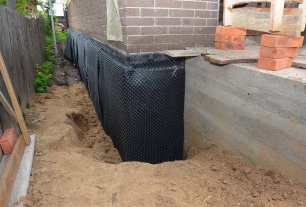 Happy homeowners after waterproofing job in Tennessee Ridge